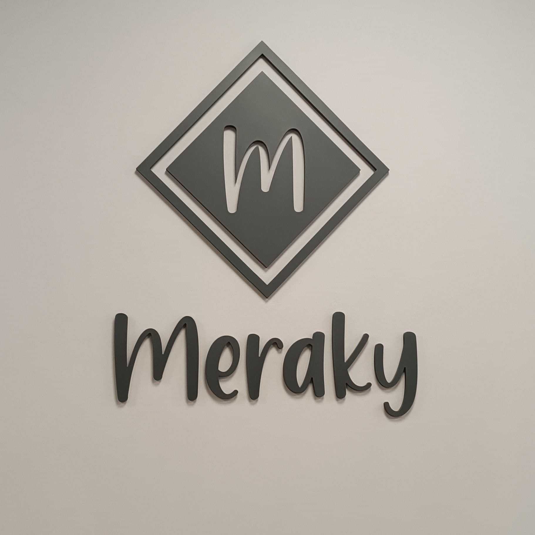 Logo de Barbería Meraky